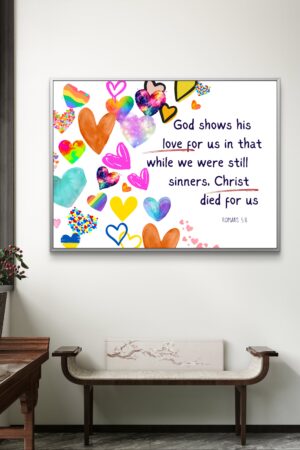 Christian wall art featuring Romans 5:8 with colorful heart icons, symbolizing God’s unconditional love through Christ’s sacrifice.